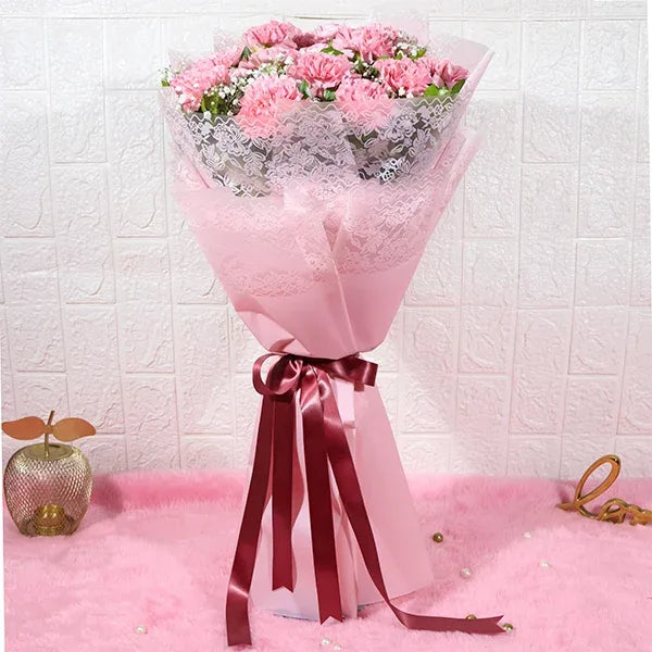 15 pink carnations bouquet with gypsophila front view