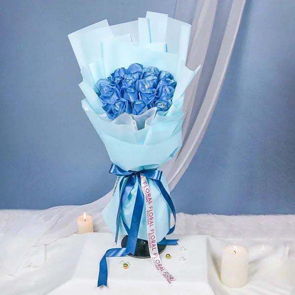 20 blue rose bouquet wrapped in light blue paper front view 2