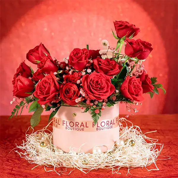 20 red roses and gypsophila in a pink box front view 2