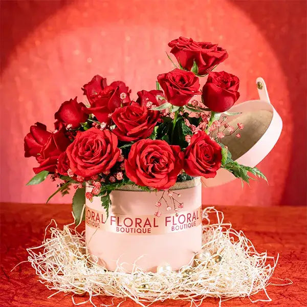 20 red roses and gypsophila in a pink box front view 3