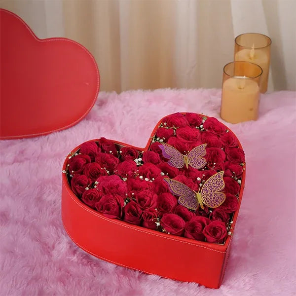 50 red roses in leather heart box with butterflies top view 2