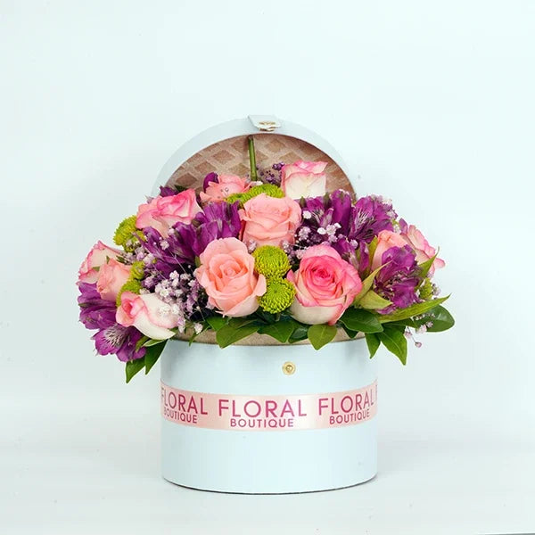 jumeila baby pink roses pink alstroemeria in a light blue gift box front view