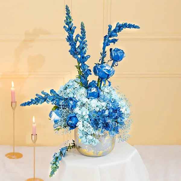 blue hydrangeas and snapdragons in a grey pot front view 2