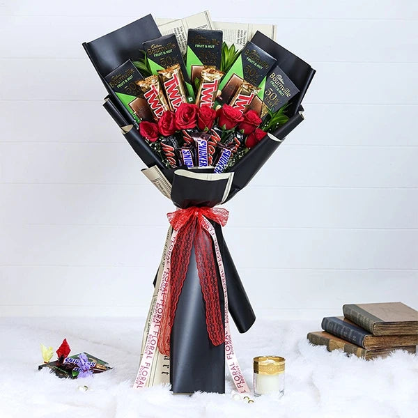 chocolate bouquet with red roses wrapped in black paper front view 2