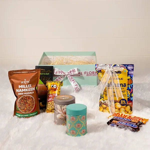 chocolate and snack hamper in a gift box front view