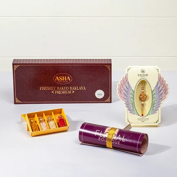 divine chakra rakhi with asha baklava roli chawal front view