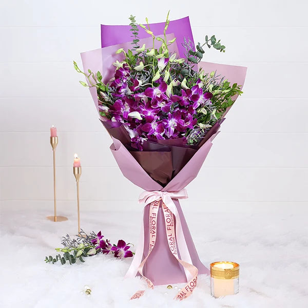 orchid bouquet with purple wrap front view 2