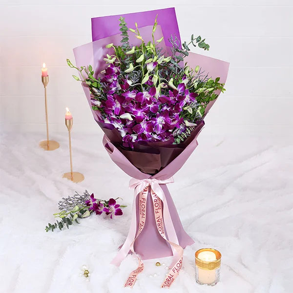 orchid bouquet with purple wrap front view 3