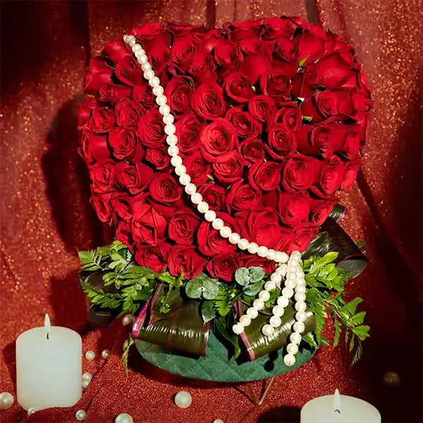 70 red roses in green leather box front view
