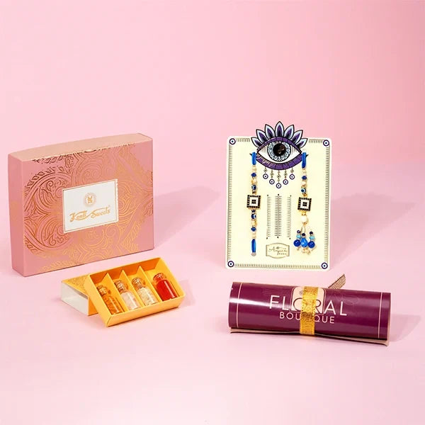 evil eye rakhi lumba set with kranti kaju katli roli chawal front view