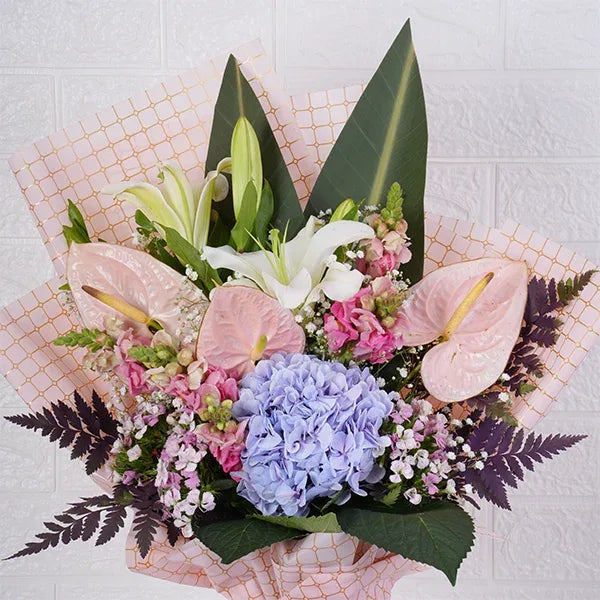 white oriental lily stems hydrangea anthurium bouquet top view