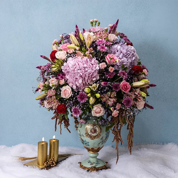 fancy flower vase arrangement of hydrangea asiatic lily pink roses front view 2