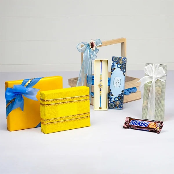 golden evil eye sun rakhi gourmet delights hamper front view