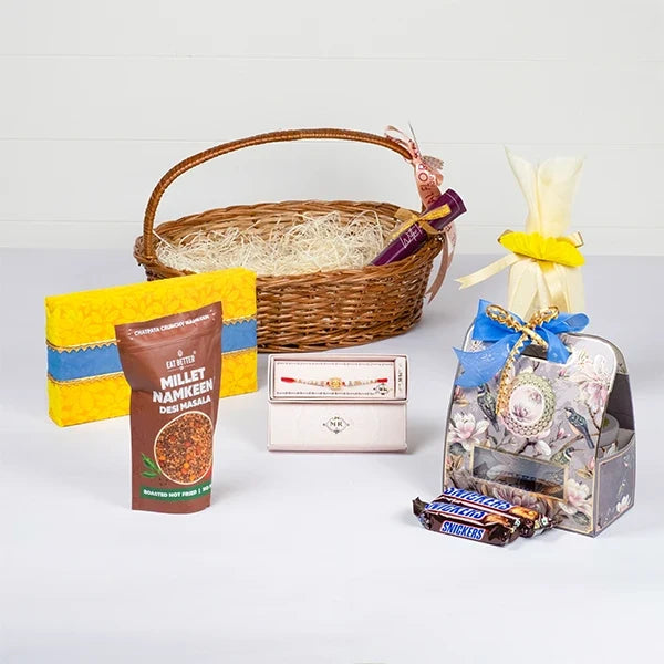 golden monogram ganpati rakhi festive hamper front view