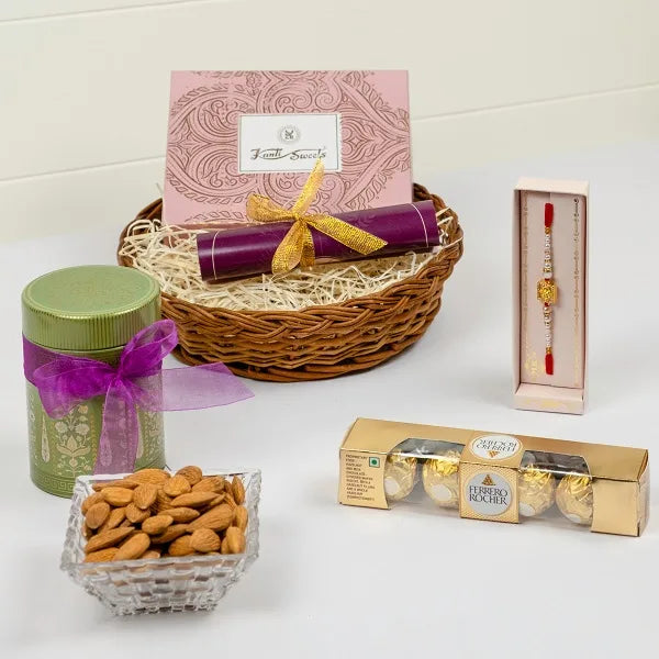 golden monogram ganpati rakhi with almonds and ferrero hamper front view