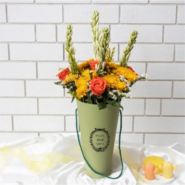 orange chrysanthemums tuberose stems goldenrod stems cone shaped box front view