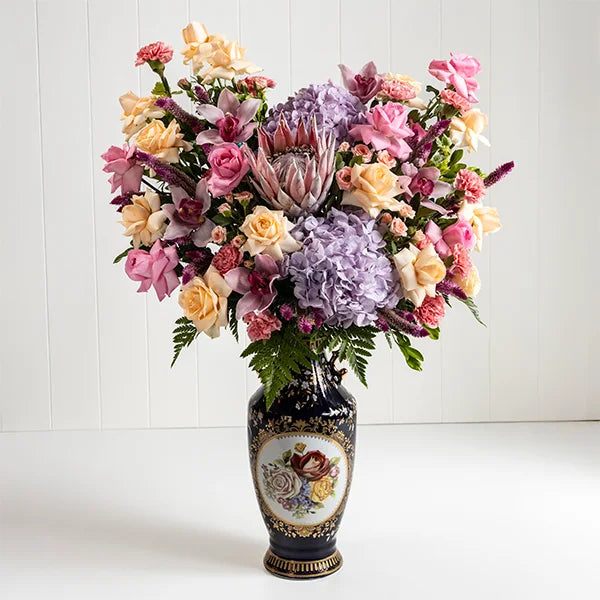 mixed fancy flower vase arrangements front view 2