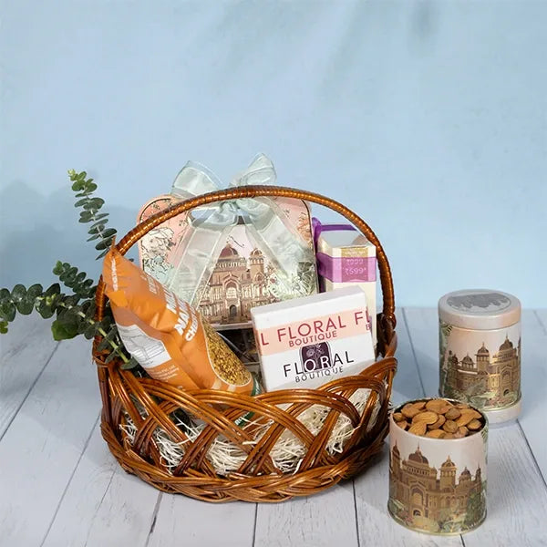 perfume gift hamper for her with chocolates almonds cookies front view