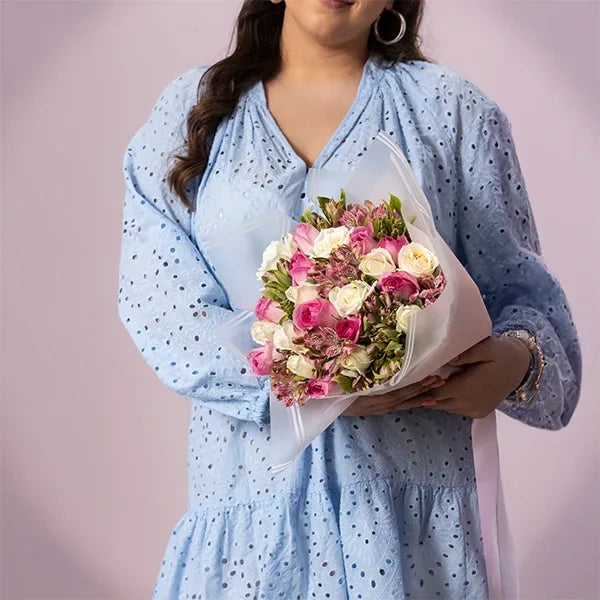 mix flower bouquet of alstroemeria pink white roses pink roses top view
