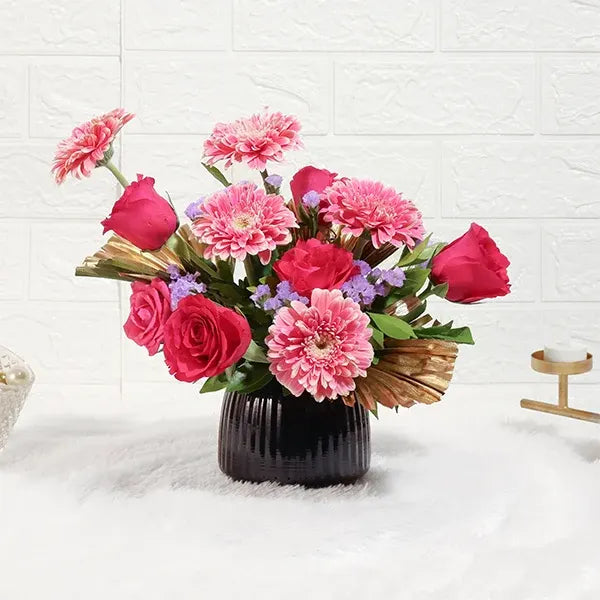 pink rose and gerbera floral display pot arrangement front view