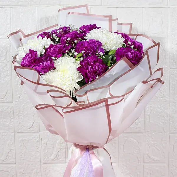 purple carnations bouquet with disbuds and gypsophila front view 2