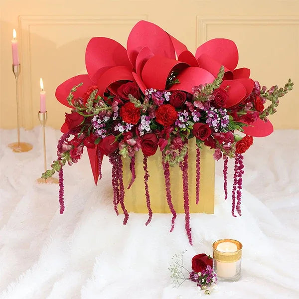 red snapdragon in box arrangement front view