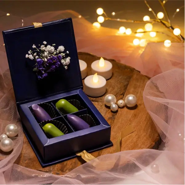 rich cocoa treasures box with capsule chocolates top view 2