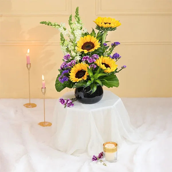 sunflowers in black glass pot front view 2