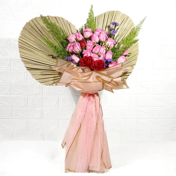 vibrant revival pink roses and red roses bouquet front view