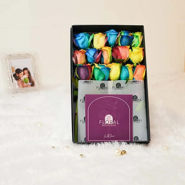 15 rainbow roses in black luxury box front view