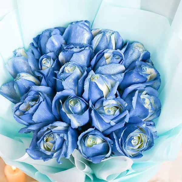 20 blue rose bouquet wrapped in light blue paper top view