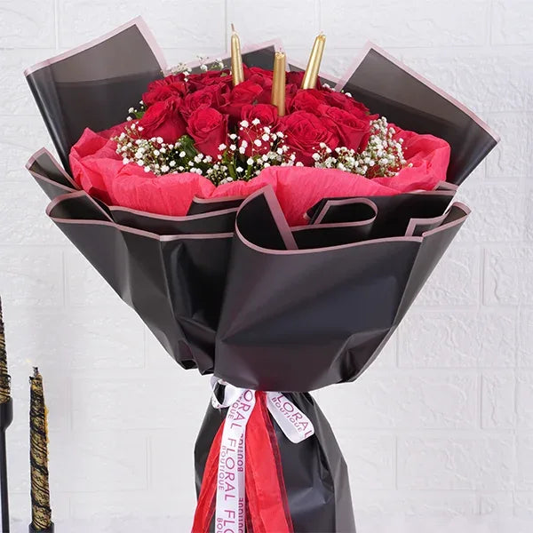 20 red roses bouquet warped in red and black paper front view 2