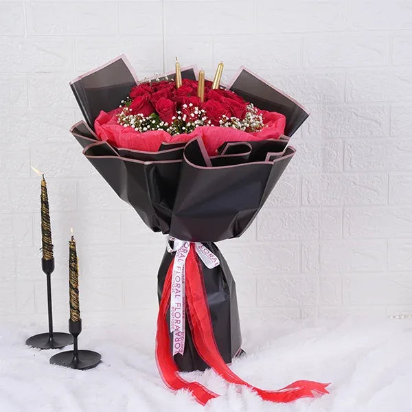 20 red roses bouquet warped in red and black paper front view