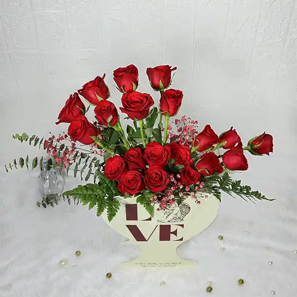 20 red roses in a heart shape love box top view