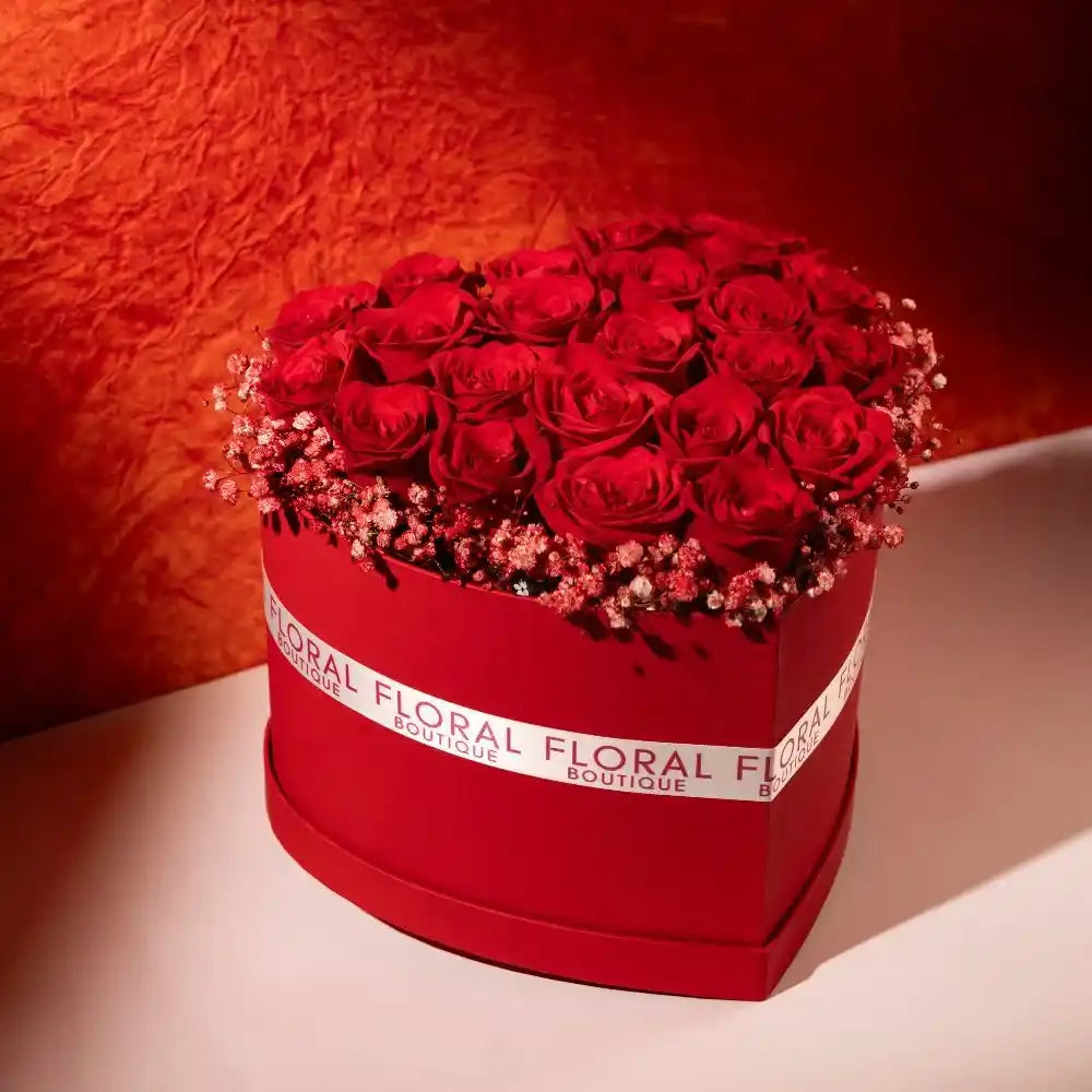25 red roses in a red heart shaped box front view 3