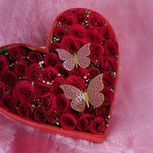 50 red roses in leather heart box with butterflies top view 3