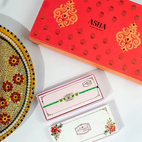 american diamond ad rakhi with asha sweets 500g front view