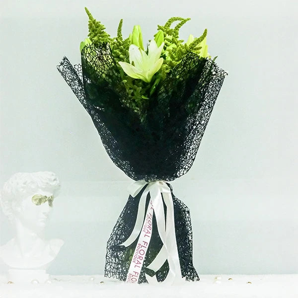 asclepias and green amaranth with kamini leaves in black net wrap front view 2