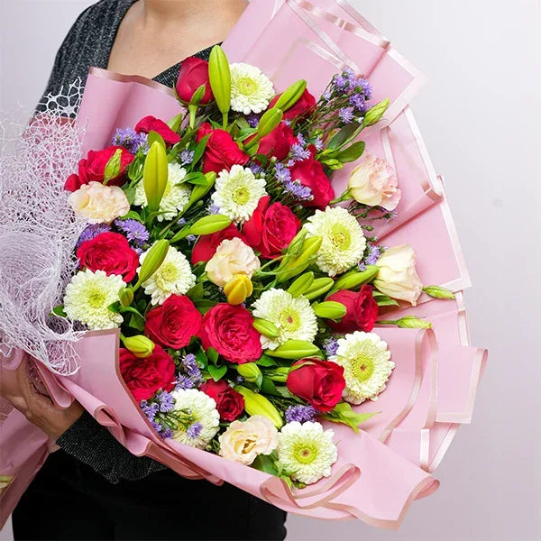 blooming elegance yellow lilies red roses bouquet closeup view
