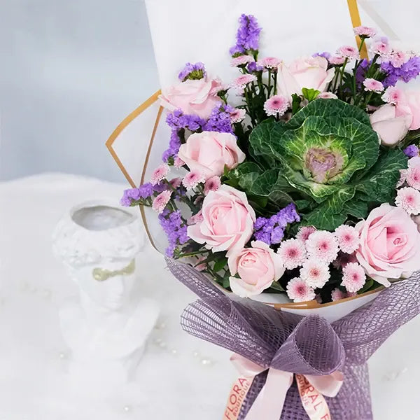 blush pink rose bouquet with brassica charm top view