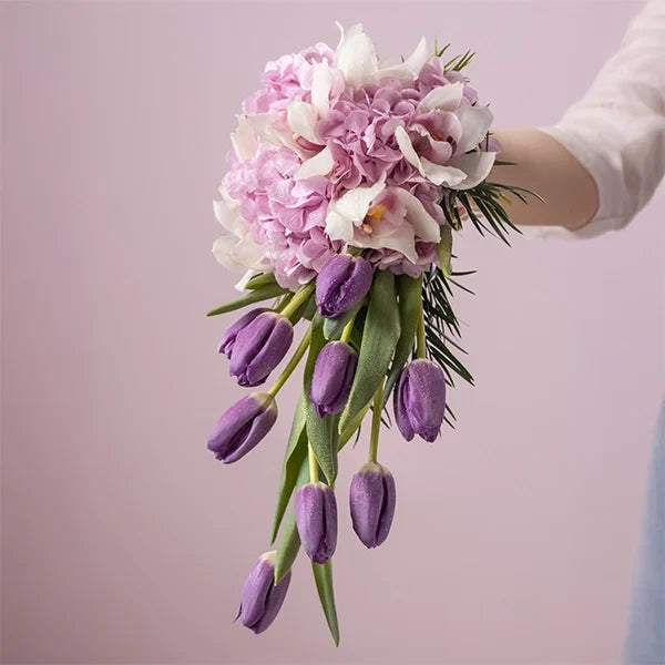 bridal bouquet of tulip hydrangea cymbidium close up view