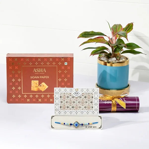 distinctive azure rakhi hamper with soan papdi front view