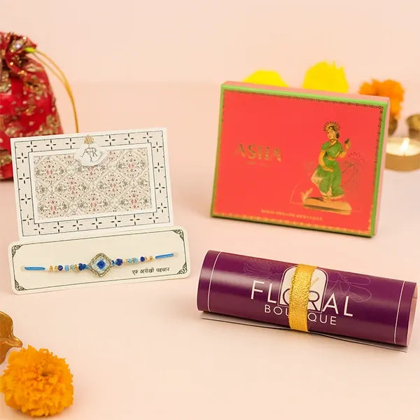 distinctive azure rakhi with asha khoya and kaju sweet mix 250g front view