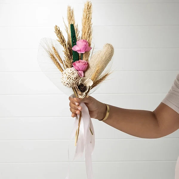 dry flower bouquet of pampas bajra stick sola pink roses front view
