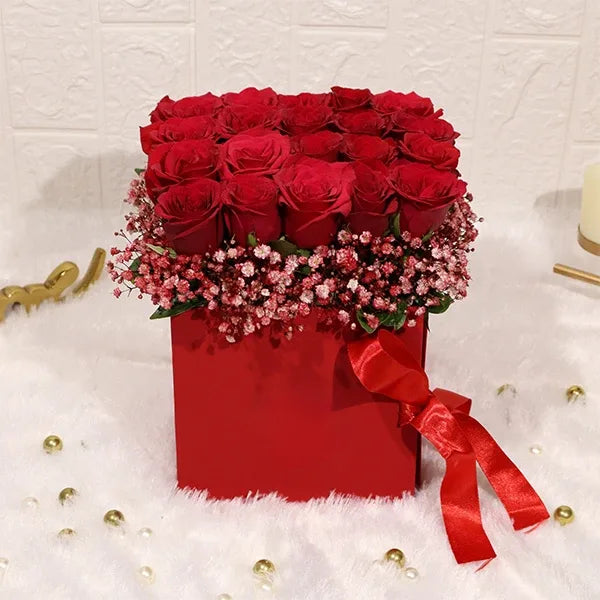 elegant box of 20 red roses with gypsophila front view