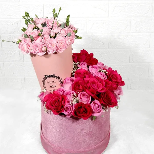 elegant spray carnations and dark pink roses close up view