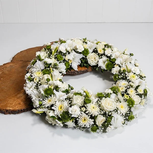 elegant white sympathy wreath closeup view 2