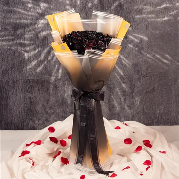 20 black rose bouquet wrapped in yellow-dotted