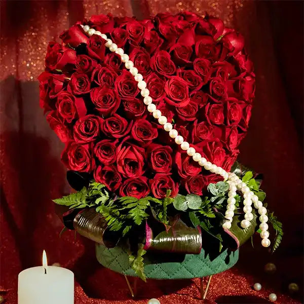 70 red roses in green leather box top view