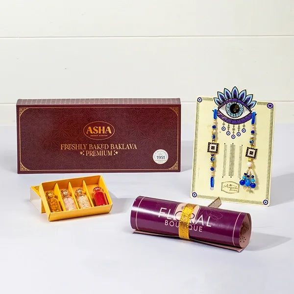 evil eye rakhi lumba set with asha baklava and roli chawal front view